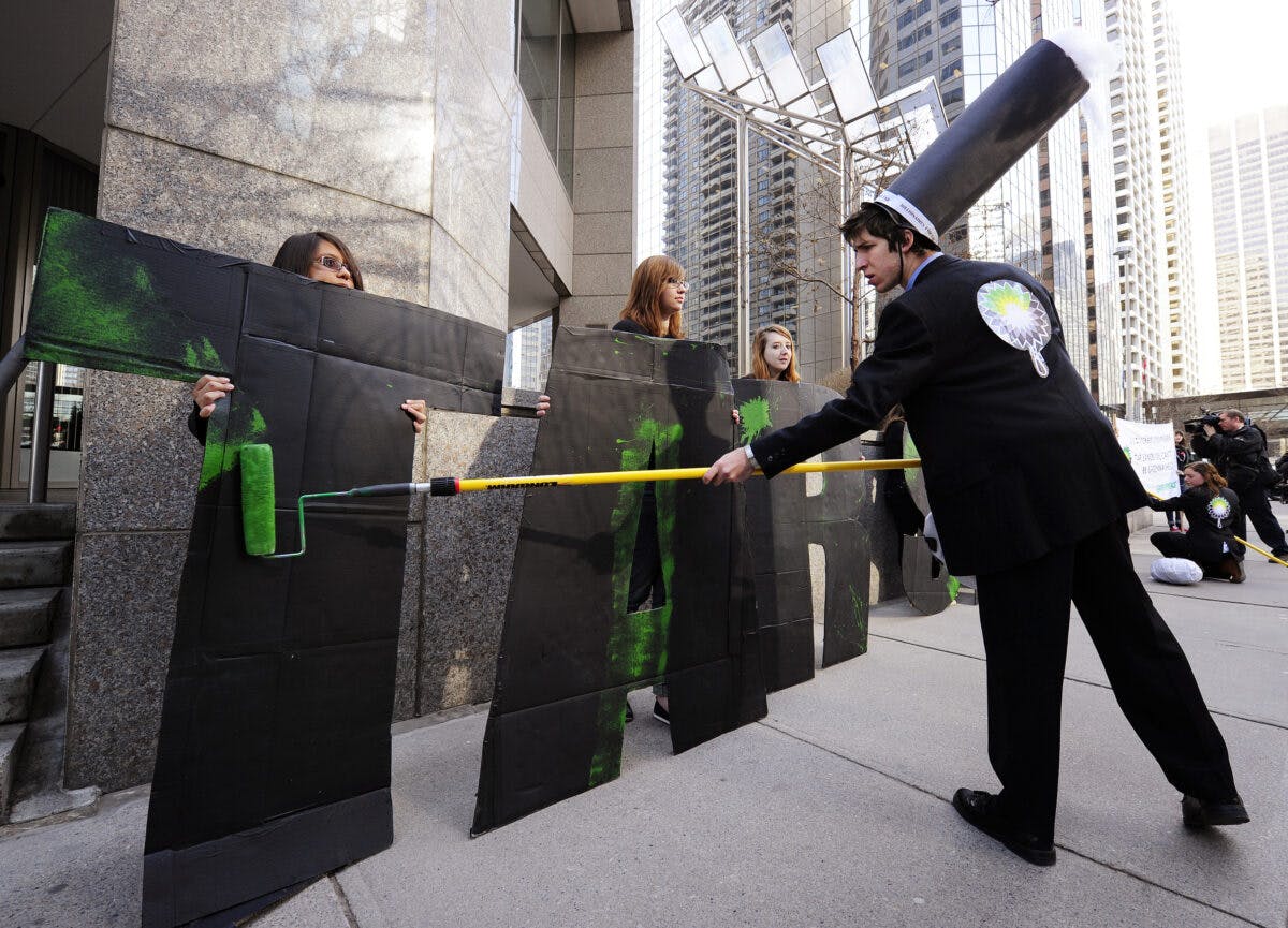 Greenpeace activists protest outside the BP Canadian offices in downtown Calgary
